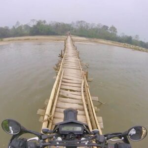 Daring ride across Vietnam make-shift bridge